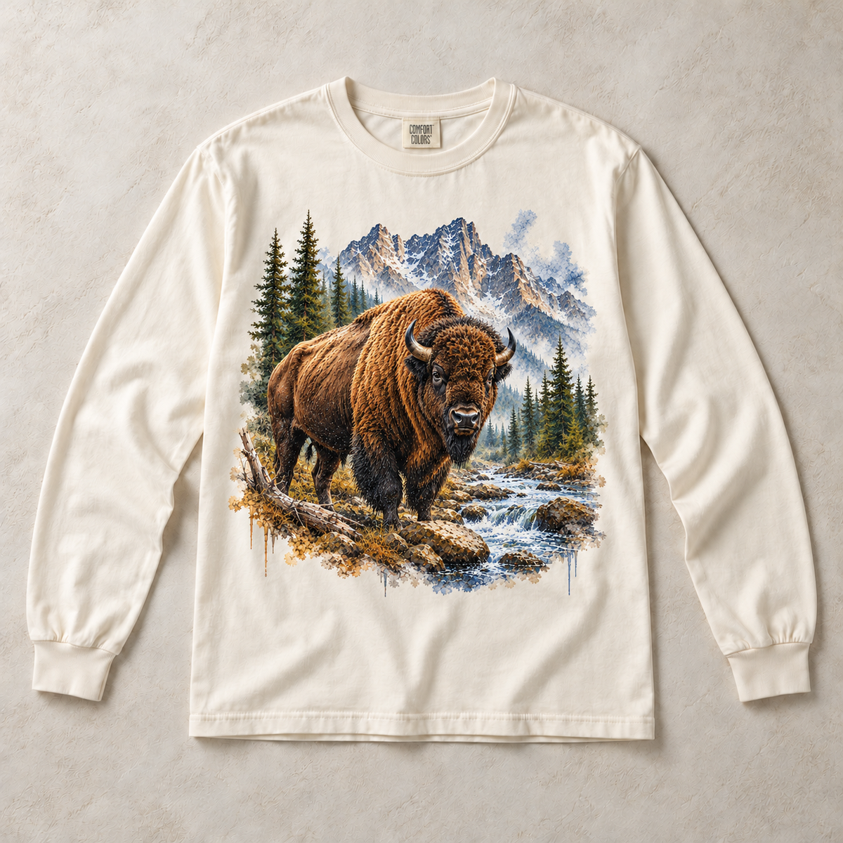 Ivory Comfort Colors long-sleeve T-shirt with Bison Mountain graphic, front flat lay