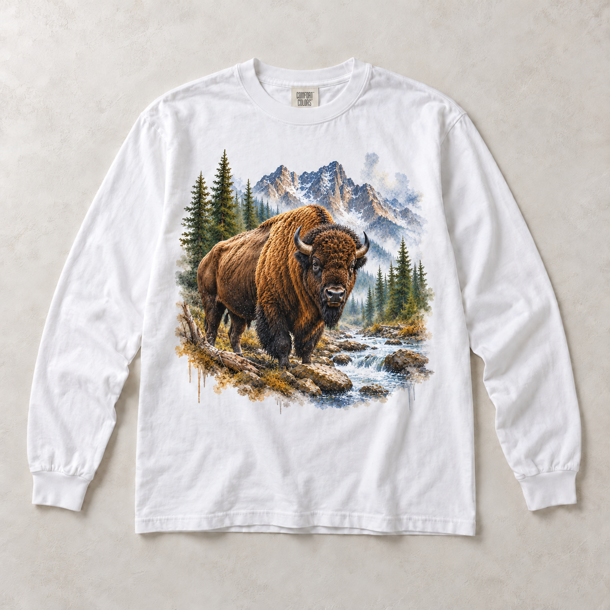 White Comfort Colors long-sleeve T-shirt with Bison Mountain graphic, front flat lay
