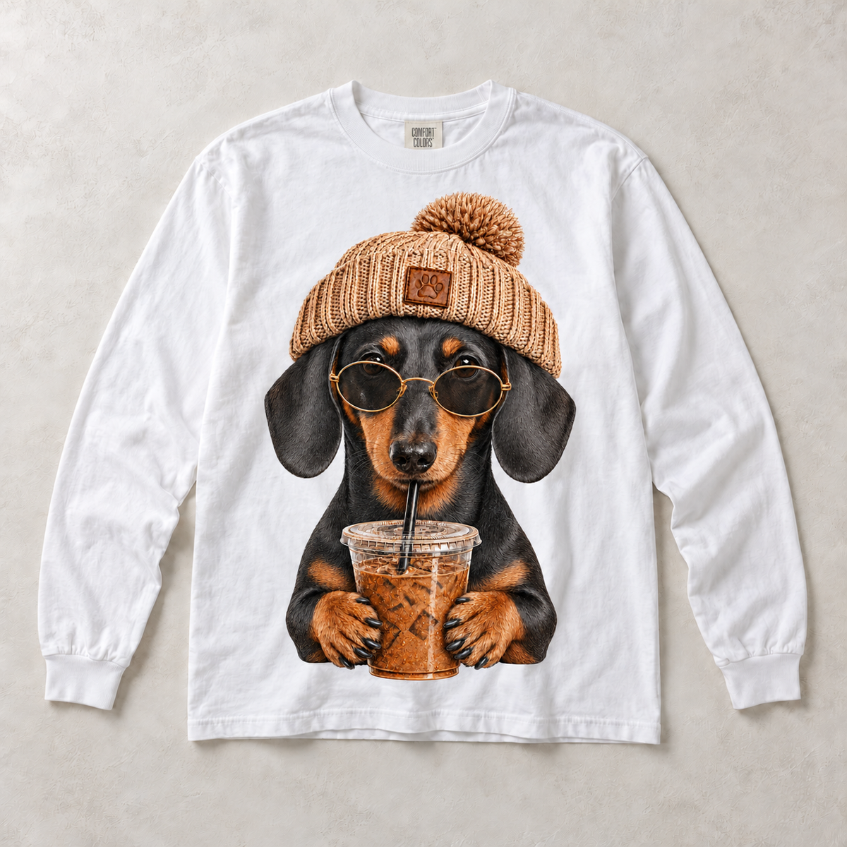 White Comfort Colors long-sleeve T-shirt with Dachshund Iced Coffee graphic, front flat lay