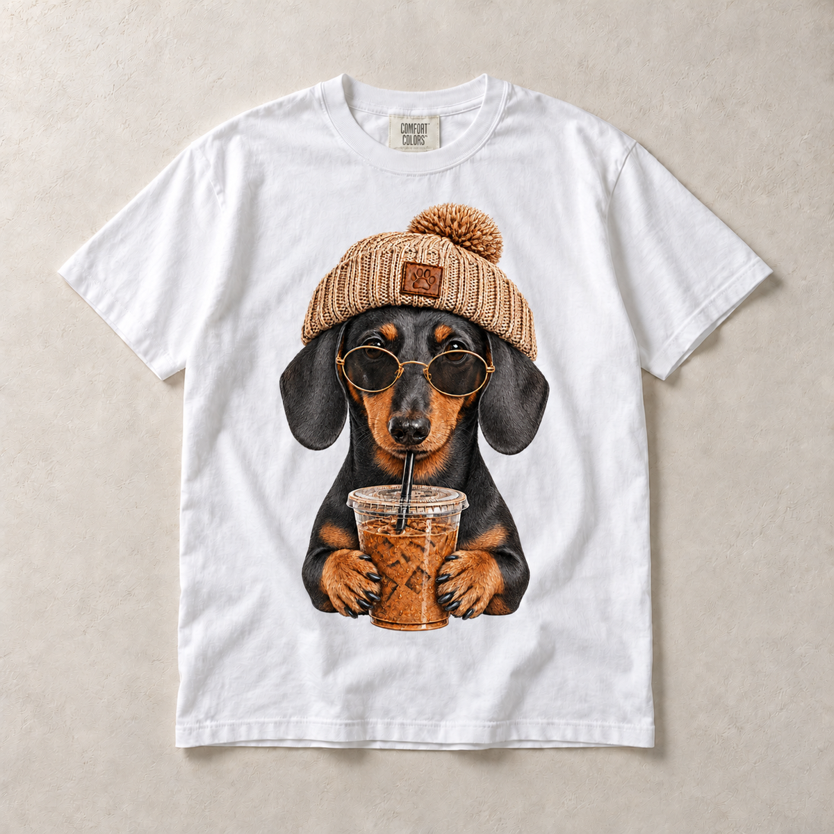 White Comfort Colors short-sleeve T-shirt with Dachshund Iced Coffee graphic, front flat lay