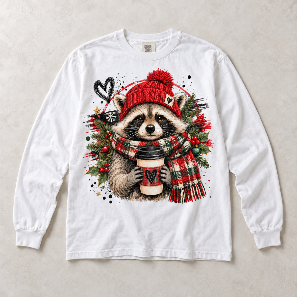 White Comfort Colors long-sleeve T-shirt with Christmas Raccoon Coffee graphic, front flat lay