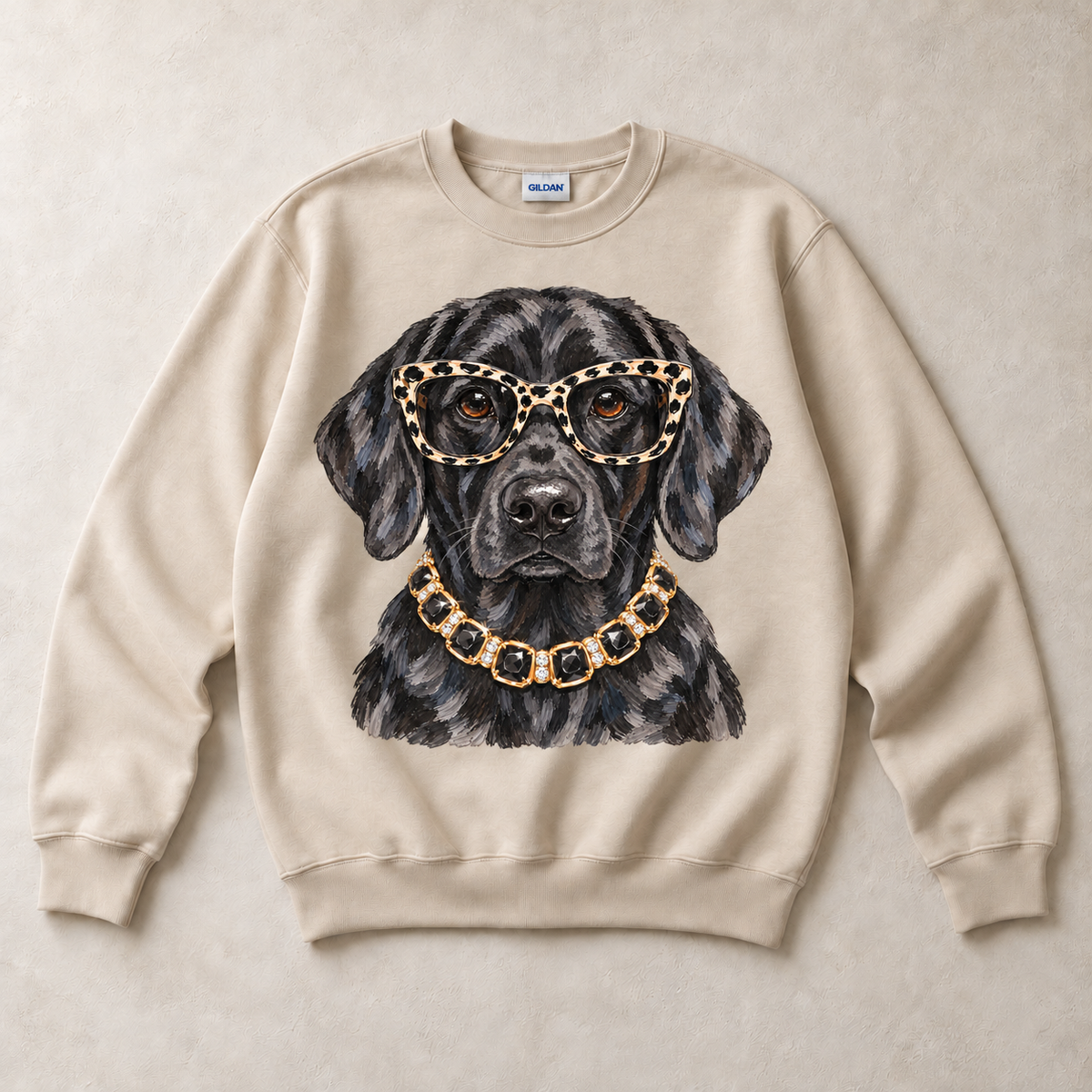 Sand Gildan crewneck sweatshirt with Black Labrador Leopard Glasses graphic, front flat lay