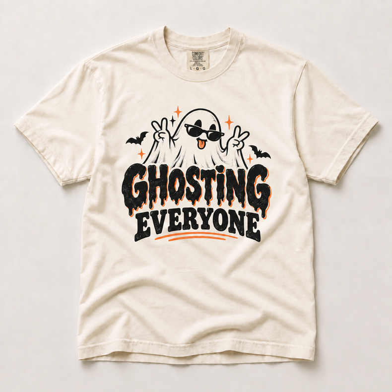 Ghosting Everyone Halloween ghost graphic on an ivory Comfort Colors T-shirt