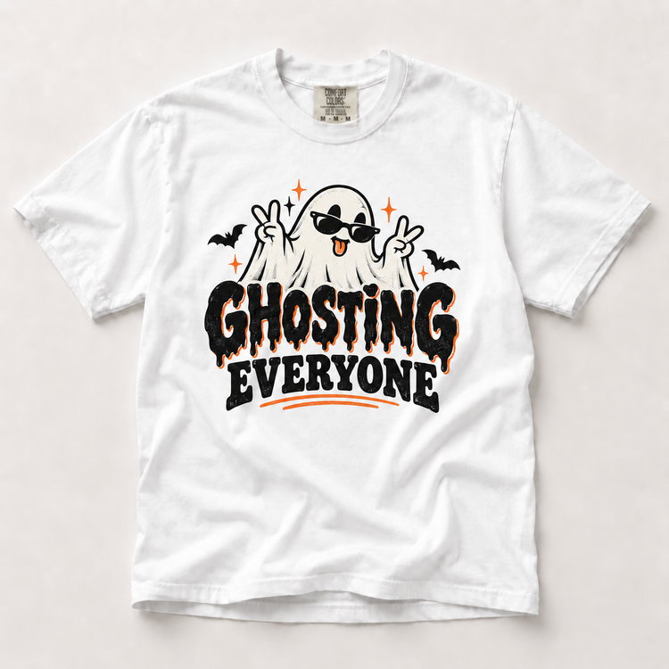 Ghosting Everyone Halloween ghost graphic on a white Comfort Colors T-shirt