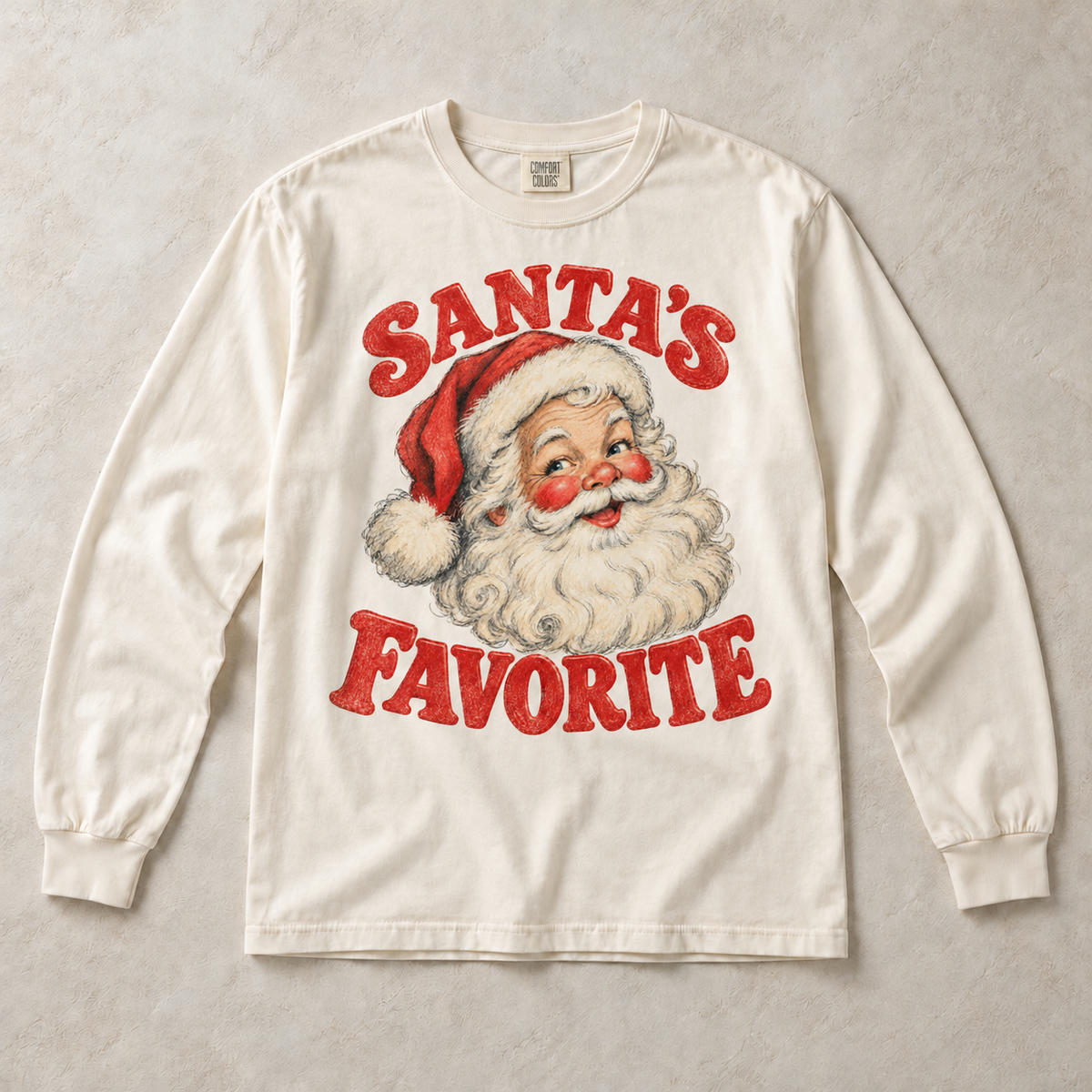 Ivory Comfort Colors long-sleeve T-shirt with Santa's Favorite Vintage Christmas graphic, front flat lay