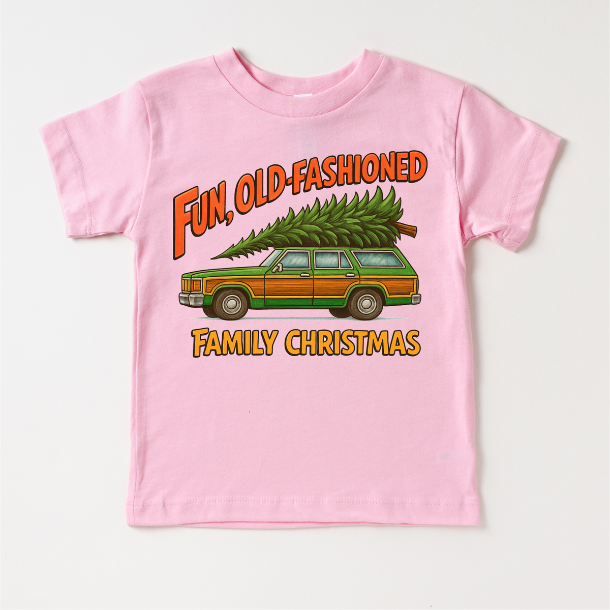 Fun Old Fashioned Family Christmas design on a pink garment.