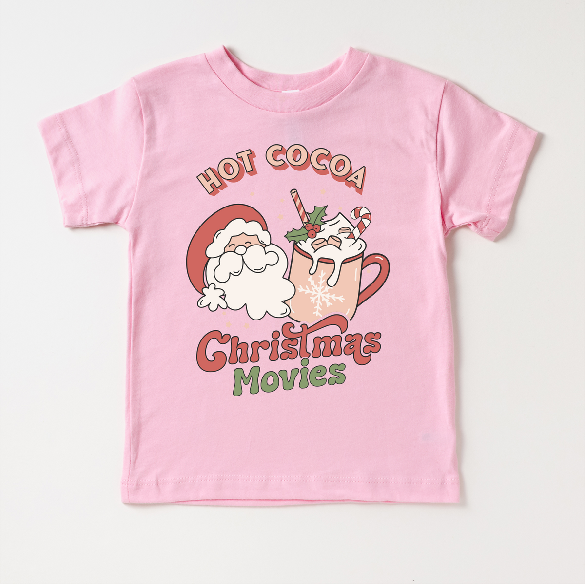 Hot Cocoa And Christmas Movies T-Shirt- Kids Christmas design on a pink garment.