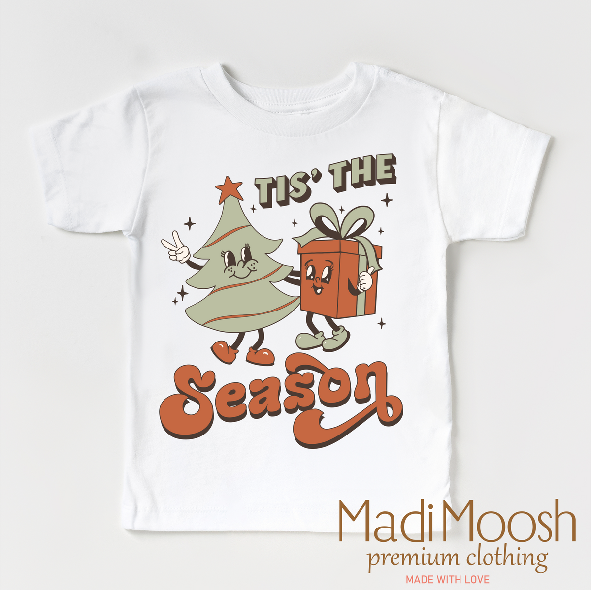 Tis The Season Christmas design on a white garment.
