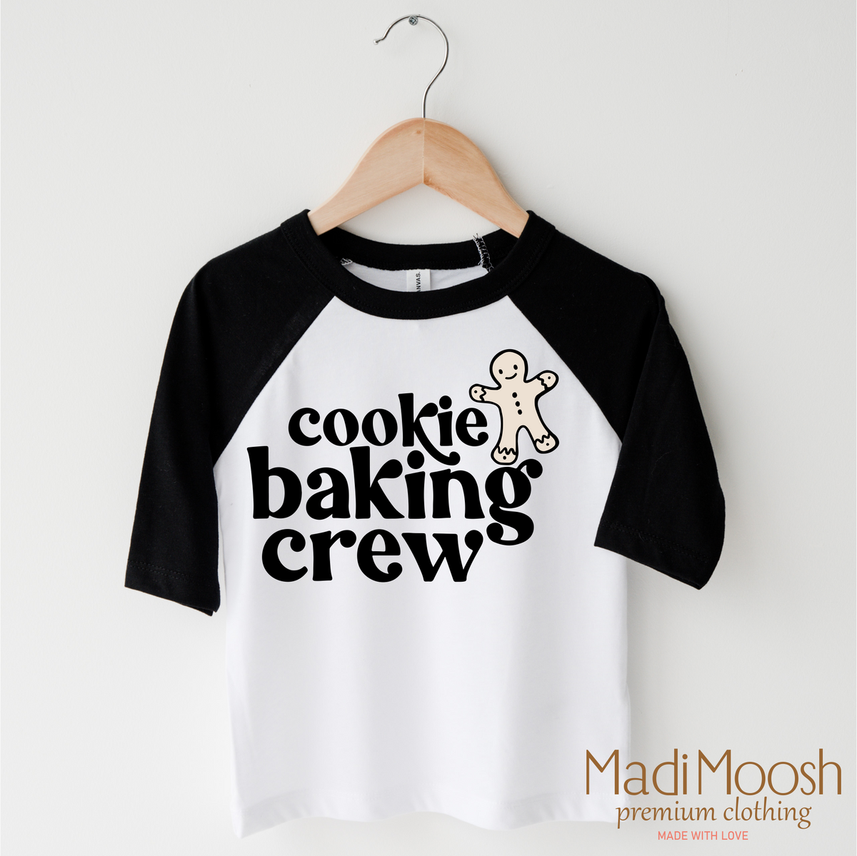 Gingerbread Cookie Baking Crew design on a black-accented shirt.