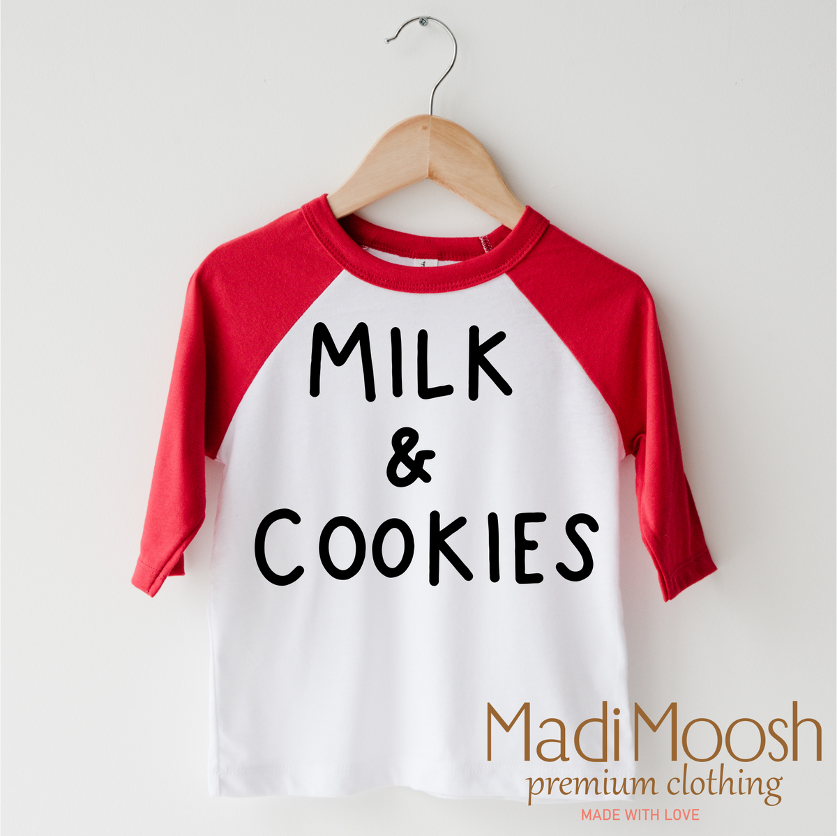 Milk And Cookies Classic Christmas design on a red-accented shirt.