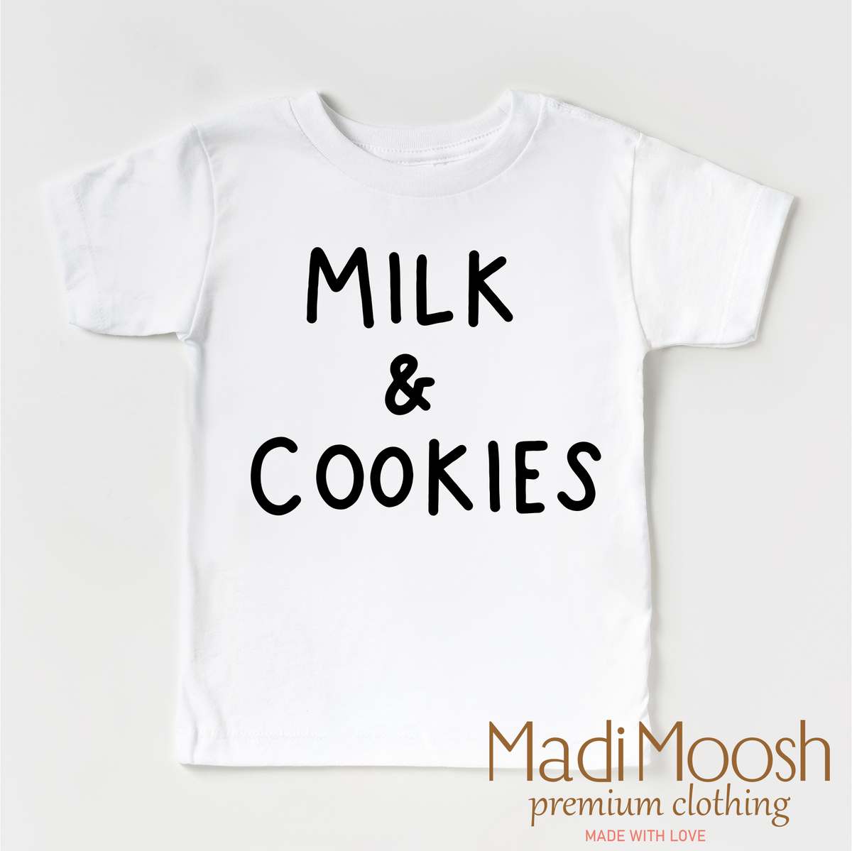 Milk And Cookies Classic Christmas design on a white garment.