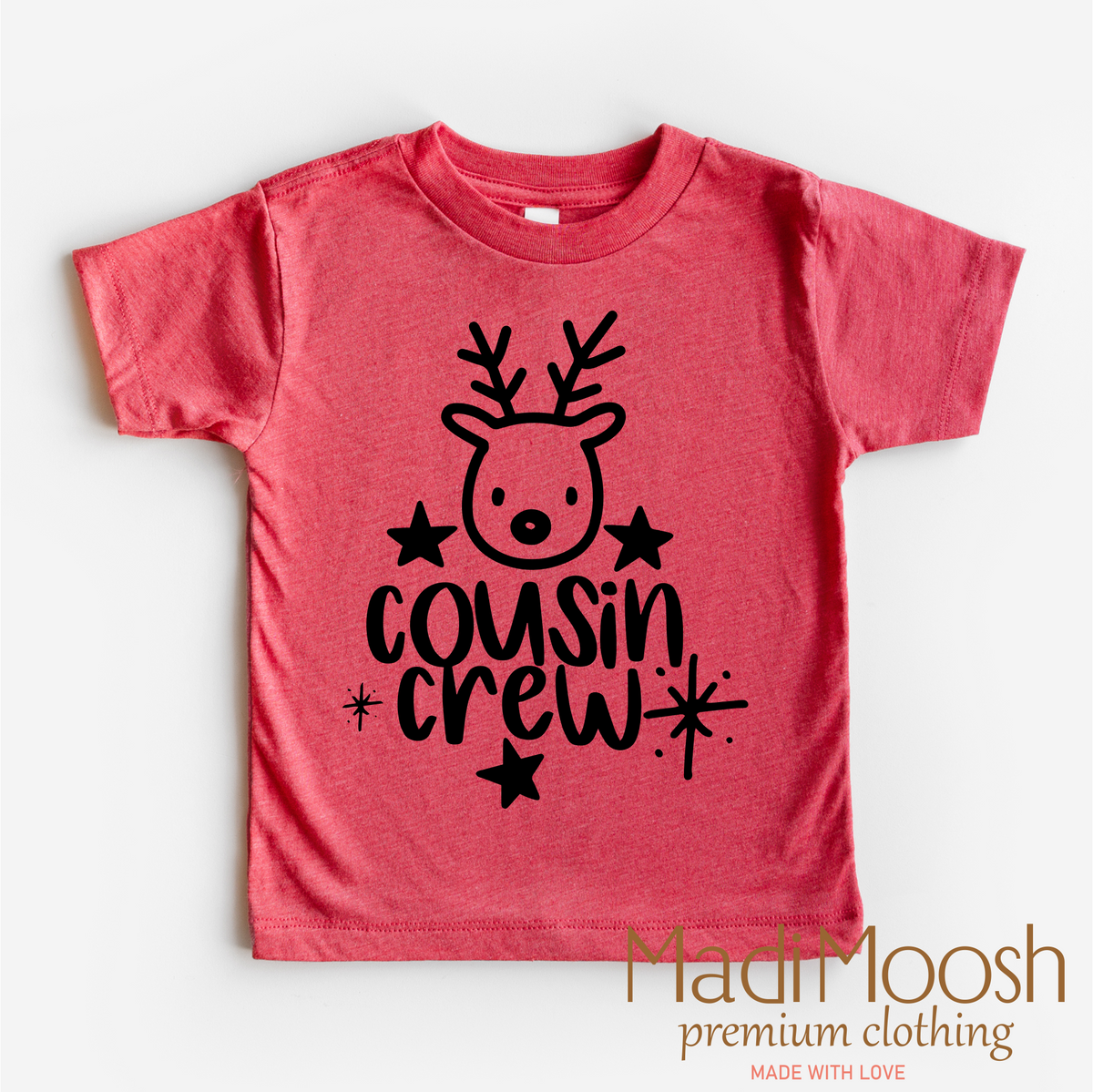 Cousin Crew Christmas design on a red-accented shirt.