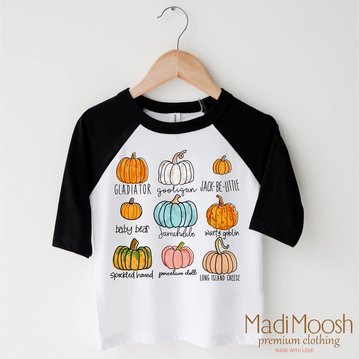 Pumpkin Patch Fall design on a black-accented shirt.