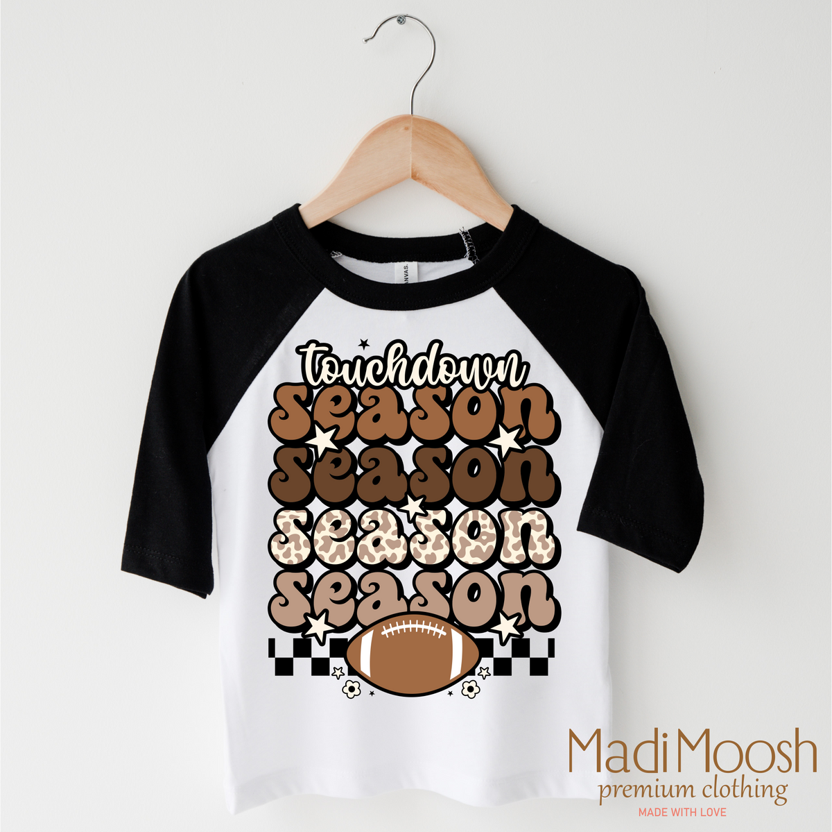 Touchdown Season Football design on a black-accented shirt.