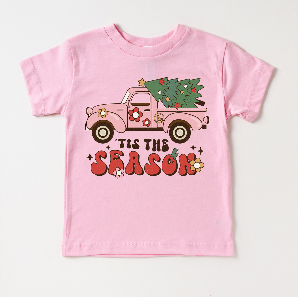 Tis The Season Vintage Pink Truck Christmas design on a pink garment.