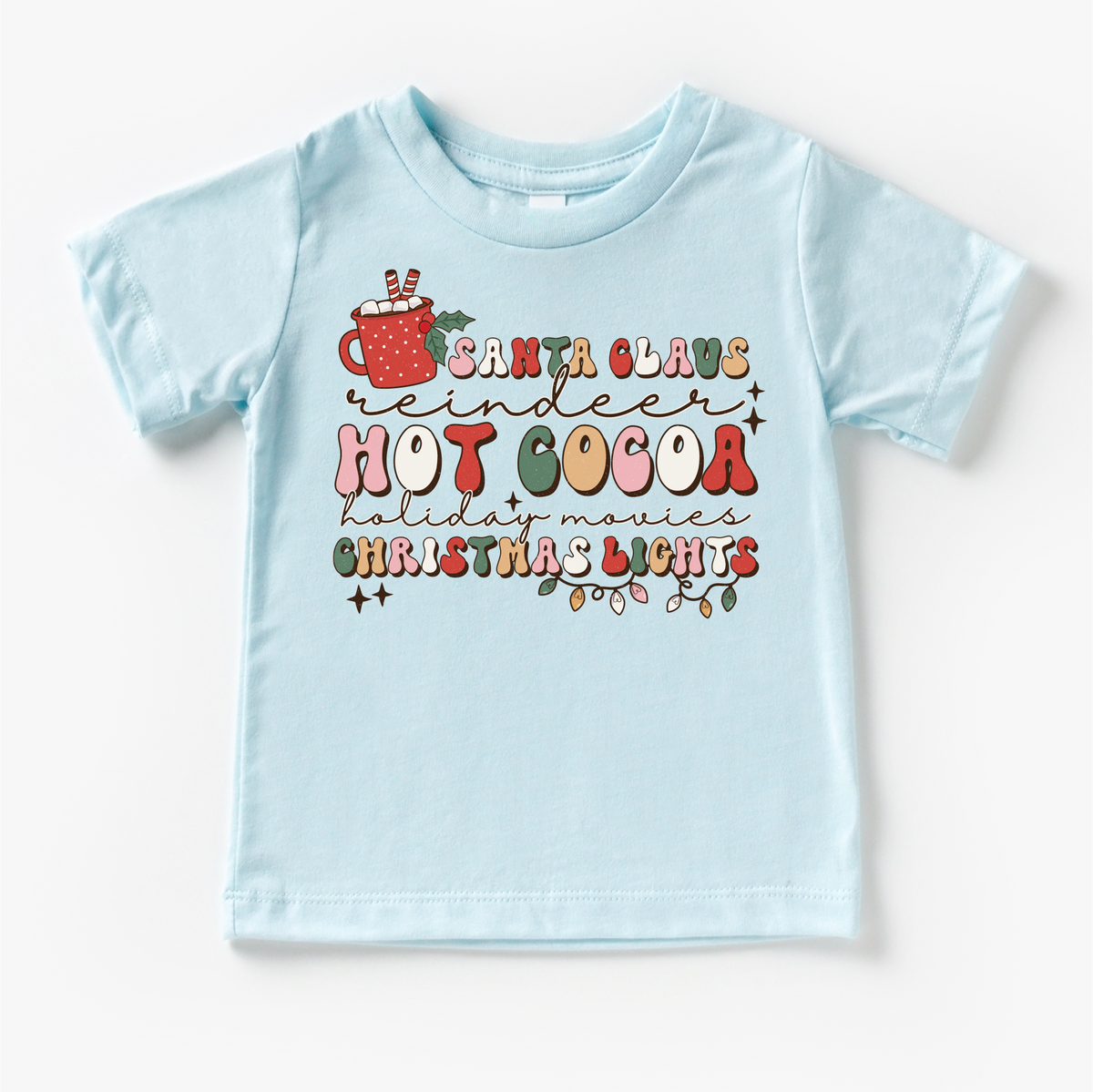 Hot Cocoa Reindeer Christmas design on a blue garment.