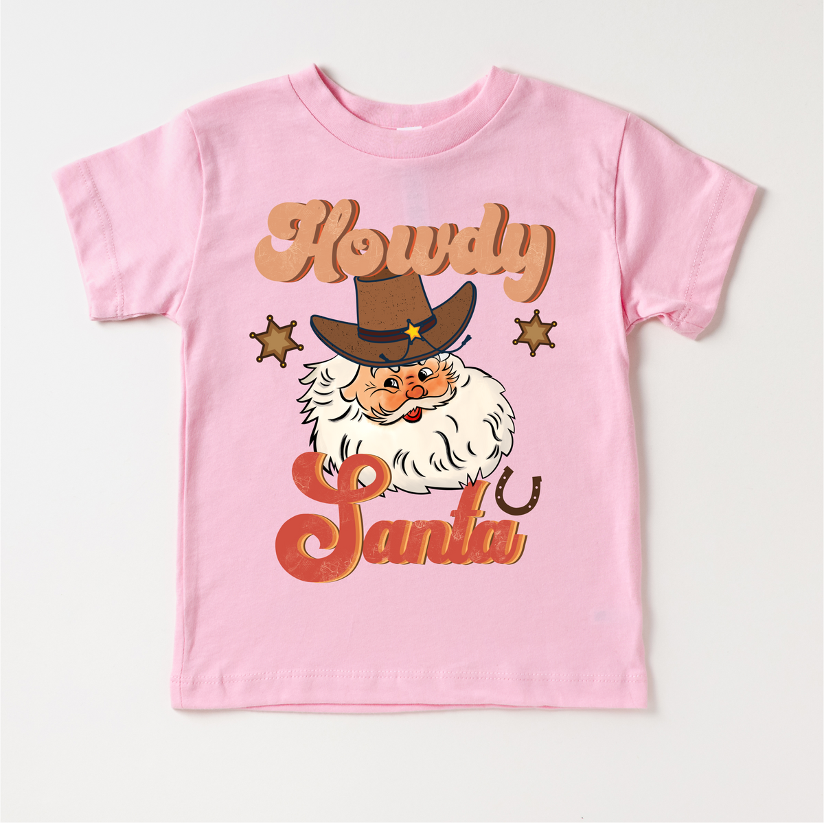 Howdy Santa Cowboy Christmas design on a pink garment.