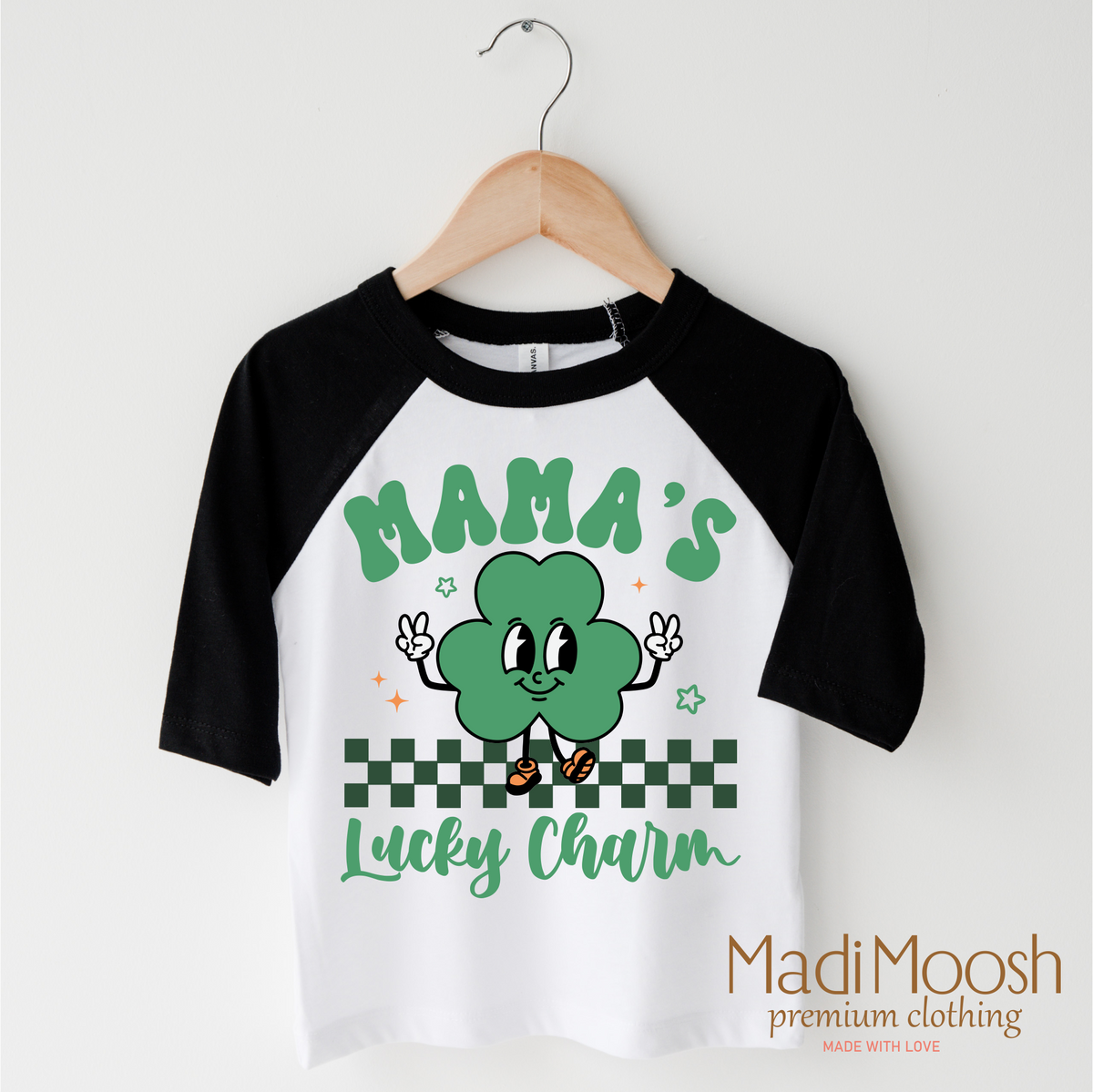 Mama's Lucky Clover St. Patrick's Day design on a black-accented shirt.