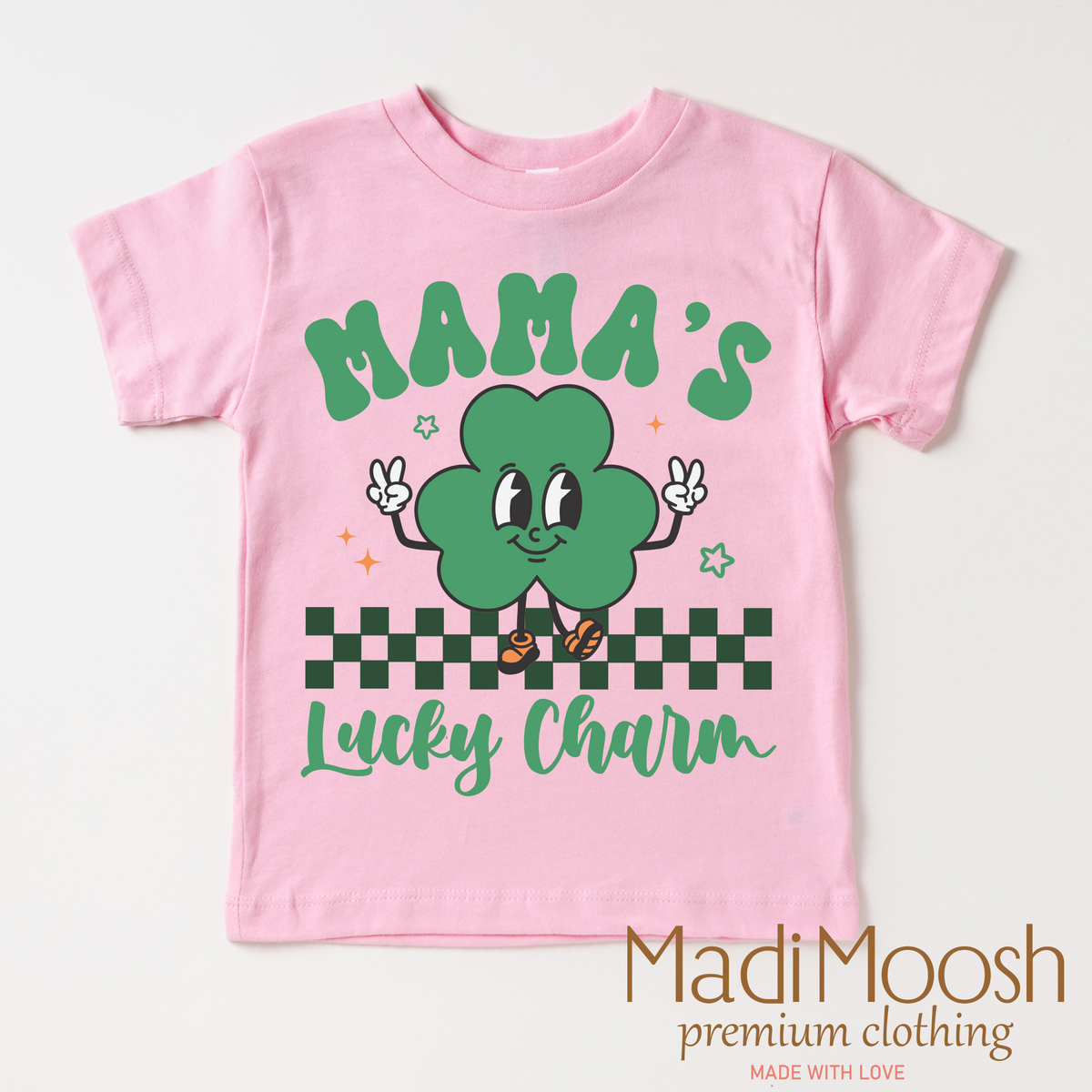 Mama's Lucky Clover St. Patrick's Day design on a pink garment.
