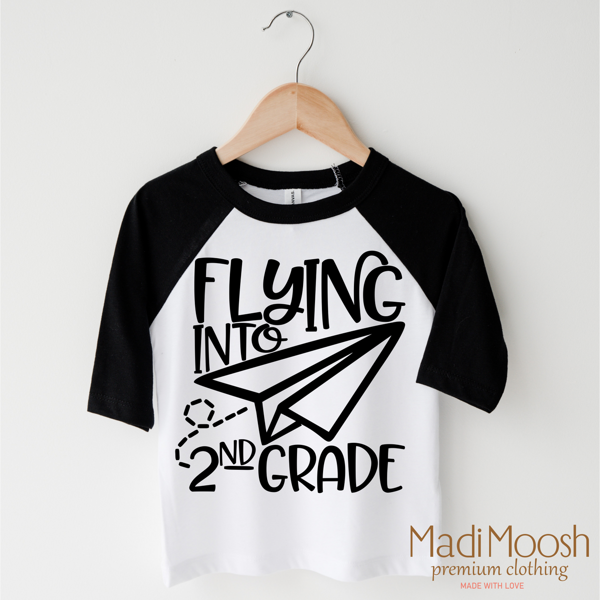 Flying Into 2nd Grade Back To School design on a black-accented shirt.