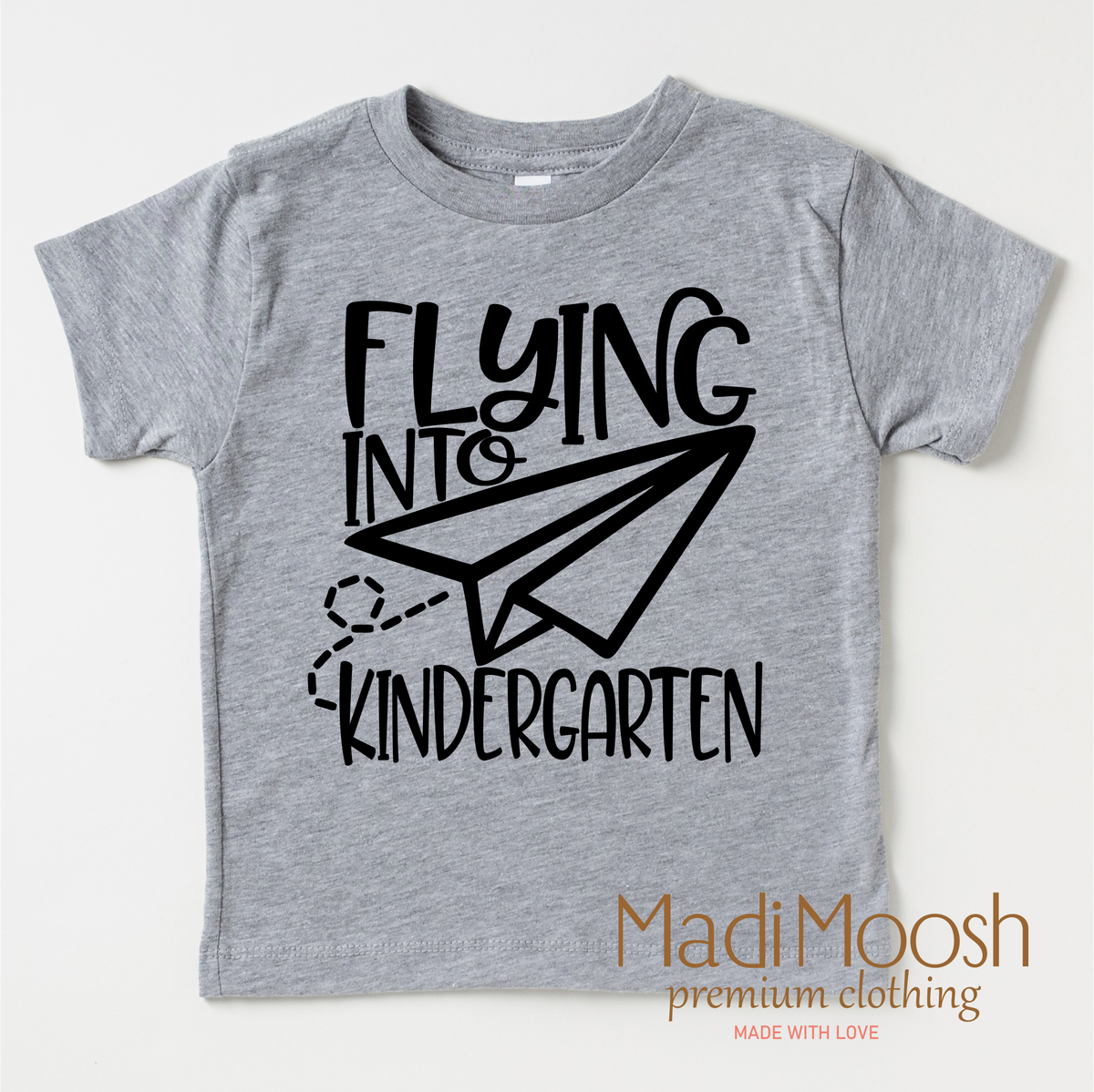 Flying Into Kindergarten Back To School graphic T-shirt by Madi Moosh