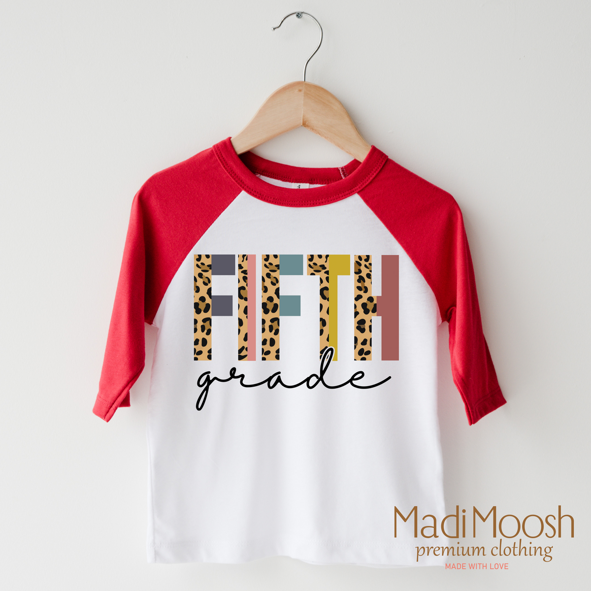 Fifth Grade design on a raglan shirt with red sleeves.