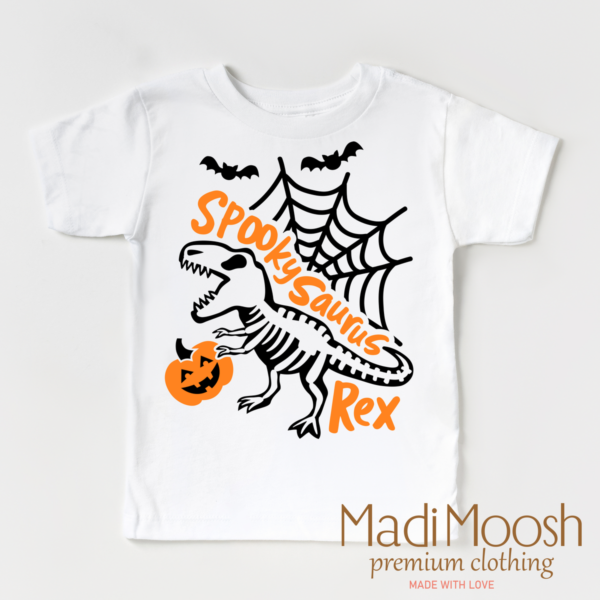 Spookysauras Dinosaur design on a white short sleeve T-shirt.