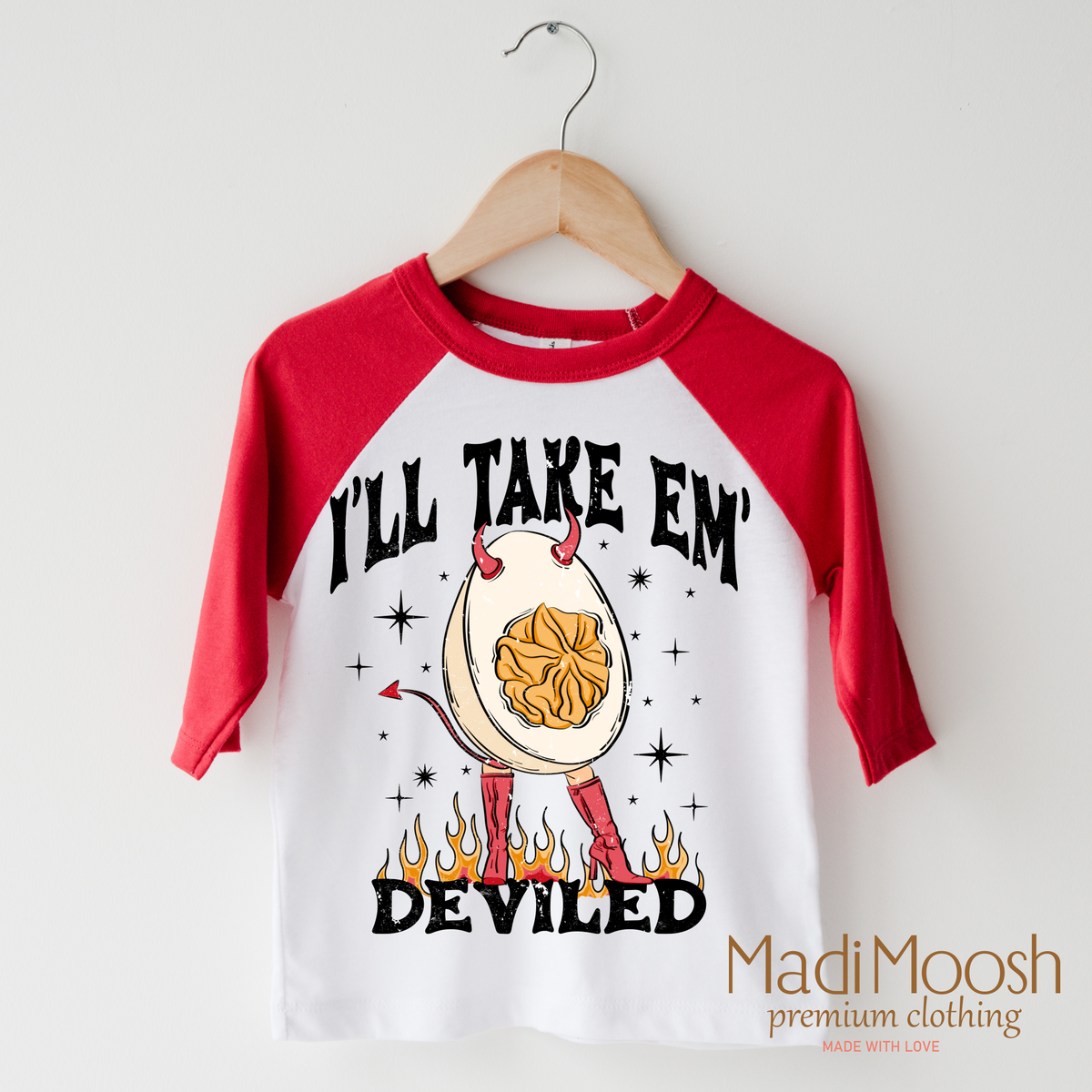 I'll Take Them Deviled Eggs design on a raglan shirt with red sleeves.