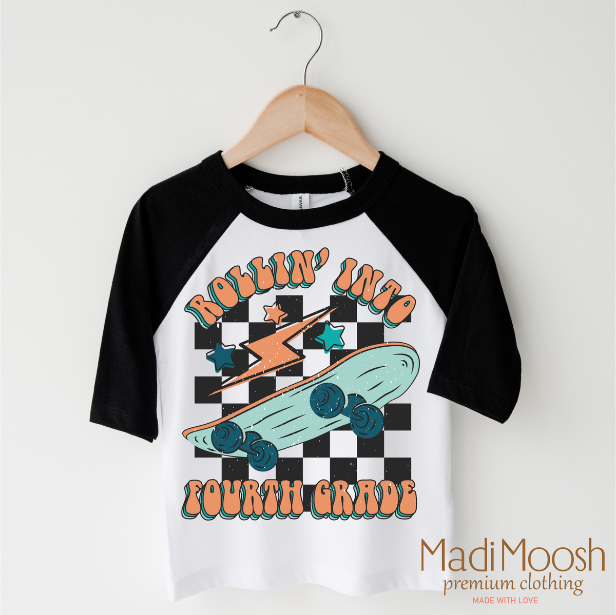 Rollin' Into 4th Back To School design on a black-accented shirt.
