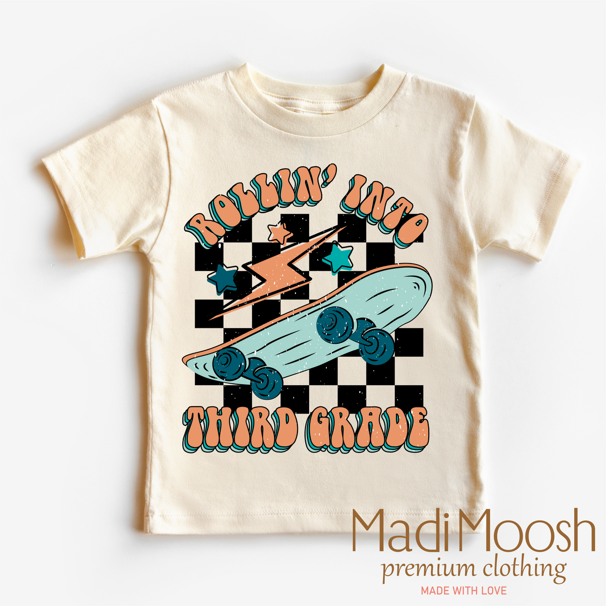 Rollin' Into 3rd Back To School design on a natural kids T-shirt.