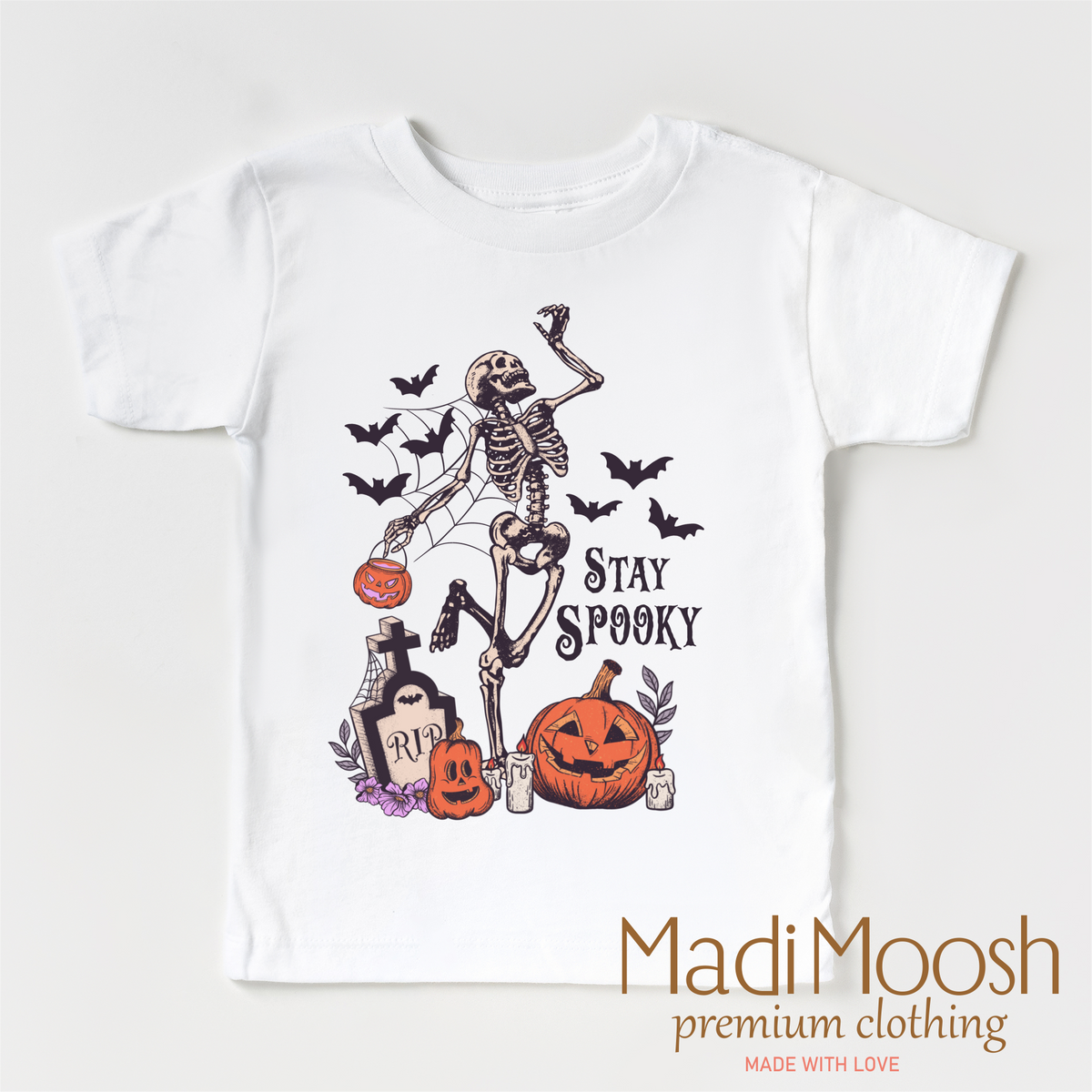 Stay Spooky design on a white short sleeve T-shirt.