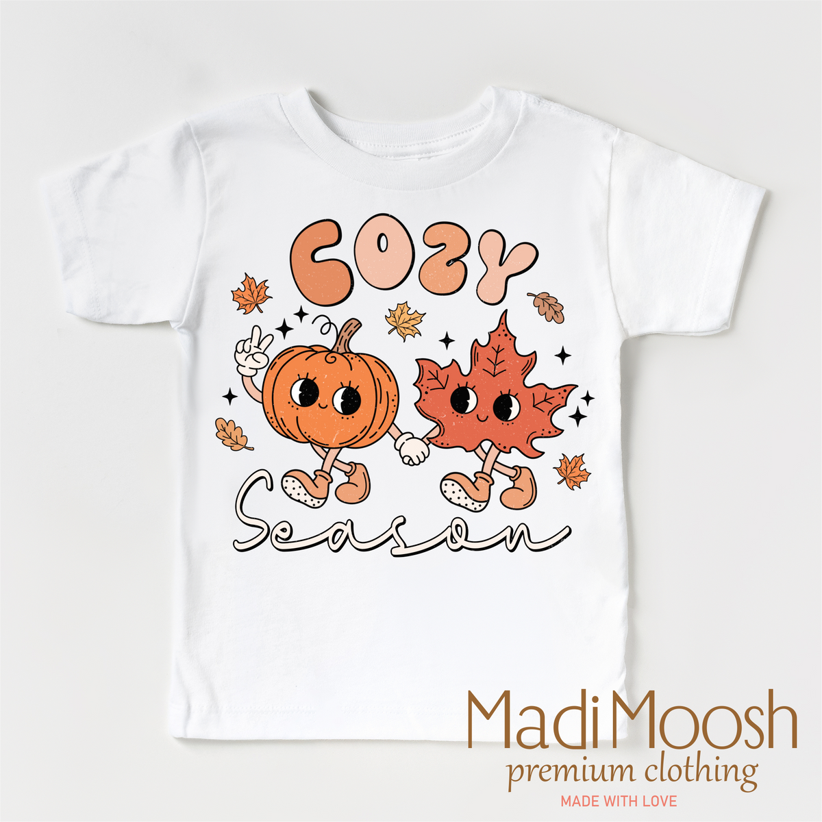 Cozy Season Fall design on a white short sleeve T-shirt.