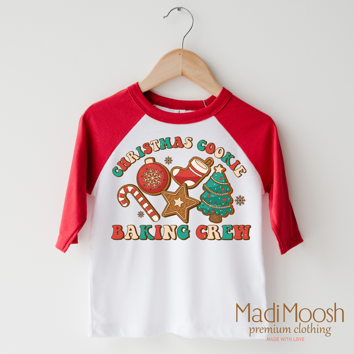 Christmas Baking Crew design on a raglan shirt with red sleeves.
