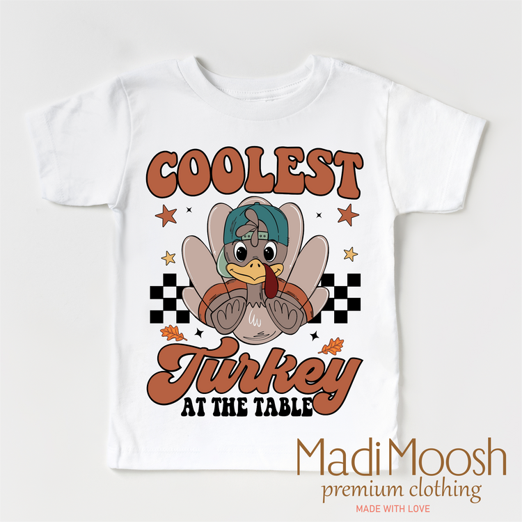 Coolest Turkey At The Table design on a white short sleeve T-shirt.