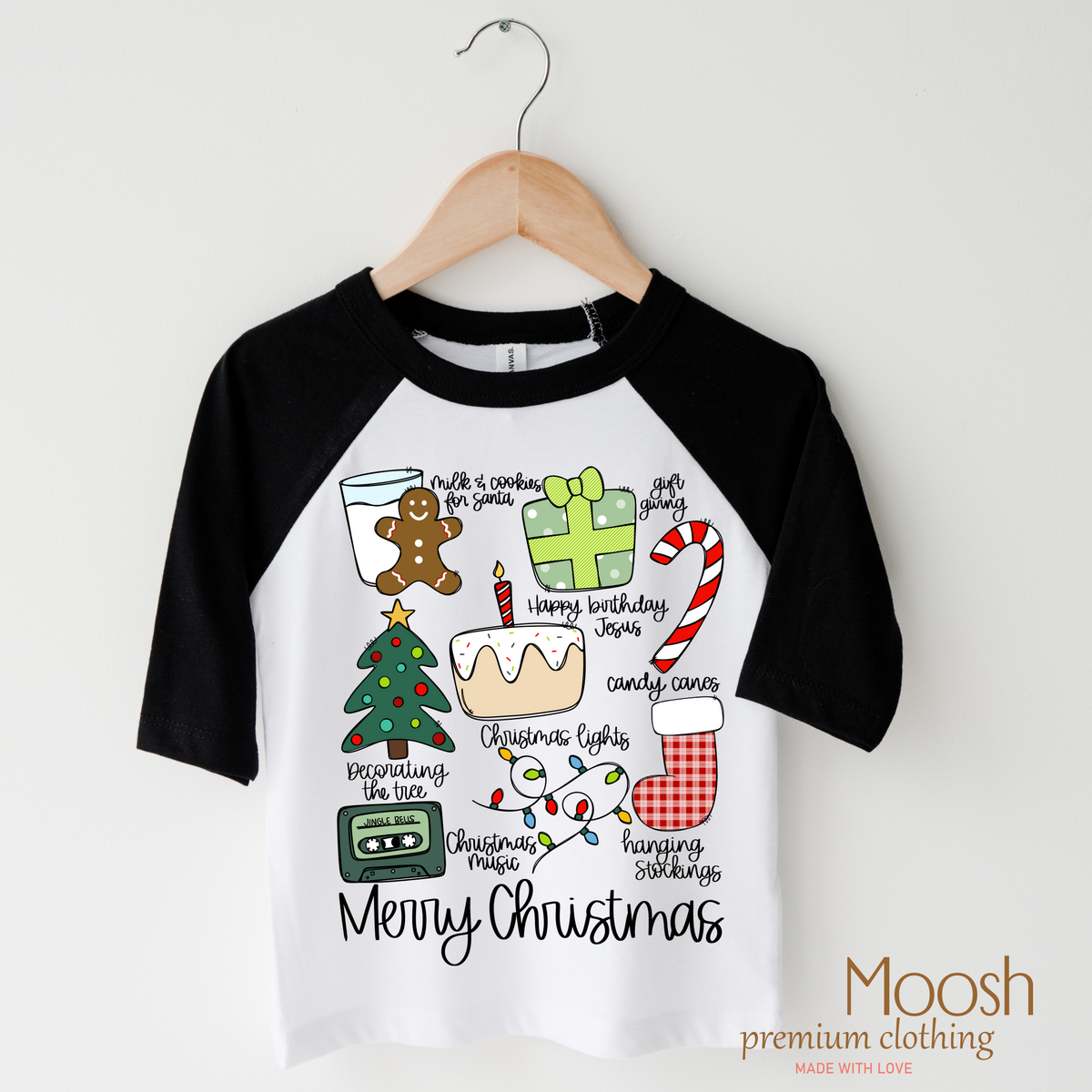 Merry Christmas design on a raglan shirt with black sleeves.