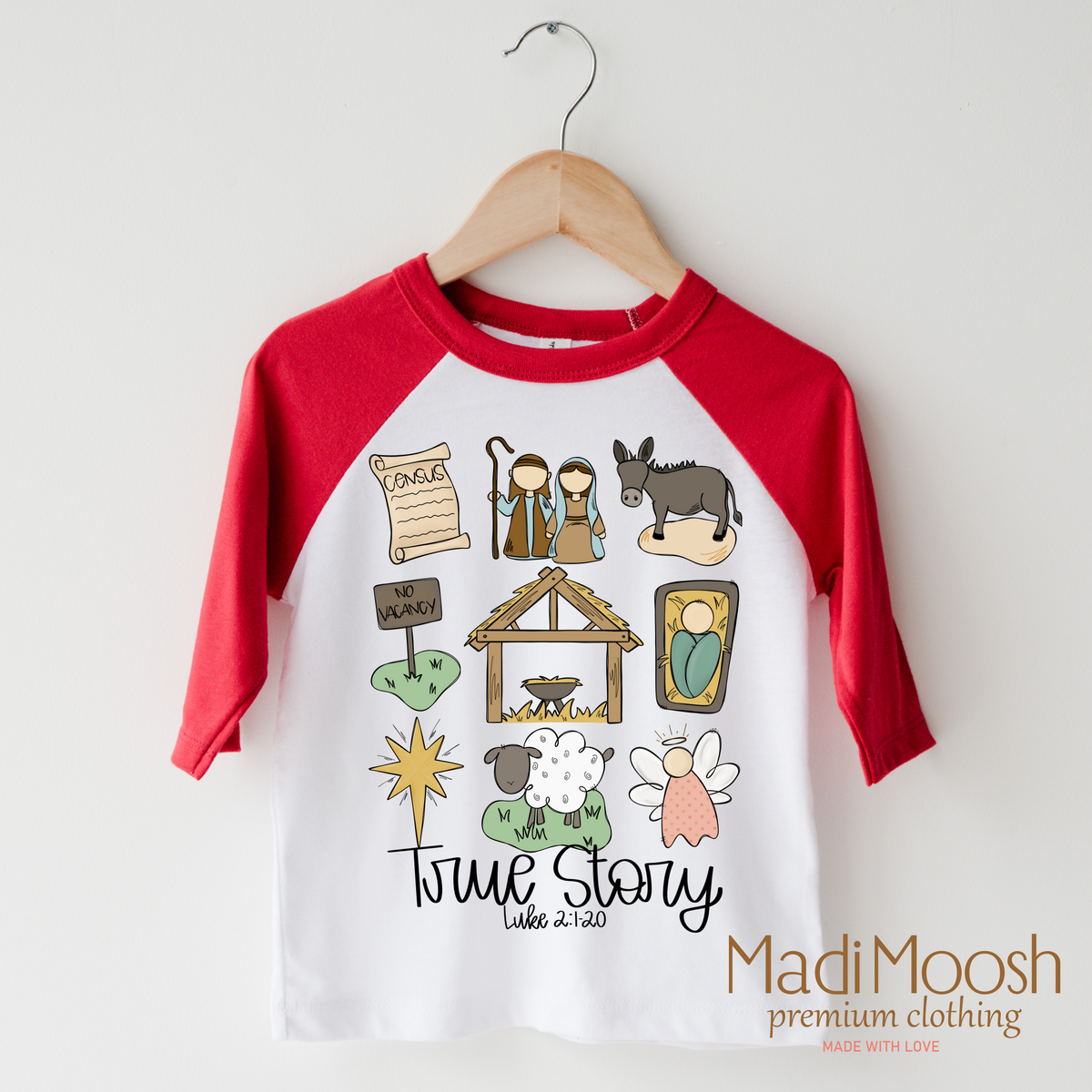 True Story Christmas design on a raglan shirt with red sleeves.