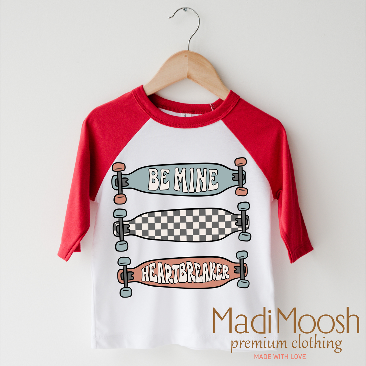Be Mine Skater Valentine's Day design on a red-accented shirt.