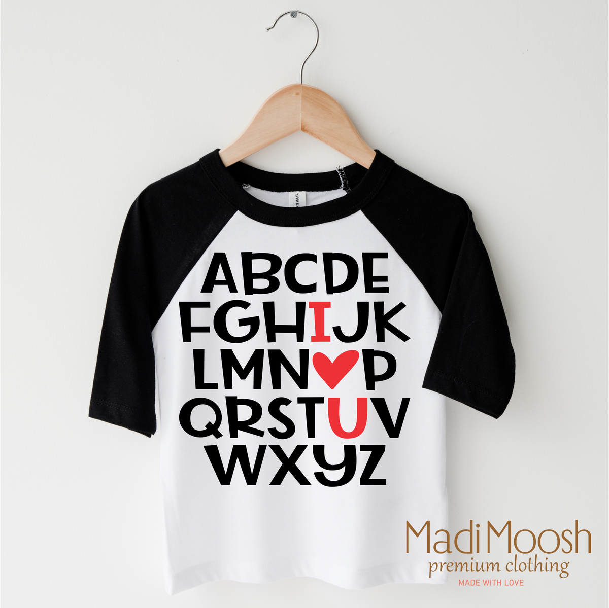 ABC I Love You Valentine's Day design on a black-accented shirt.