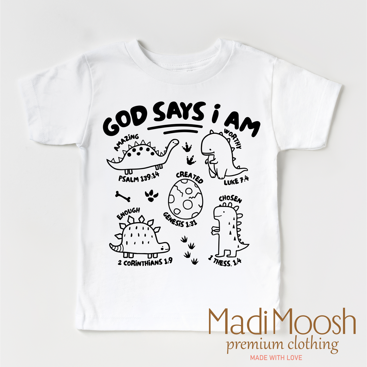 God Says I Am Dinosaur design on a white garment.