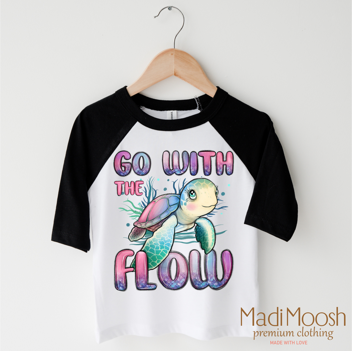 Go With The Flow Turtle design on a black-accented shirt.