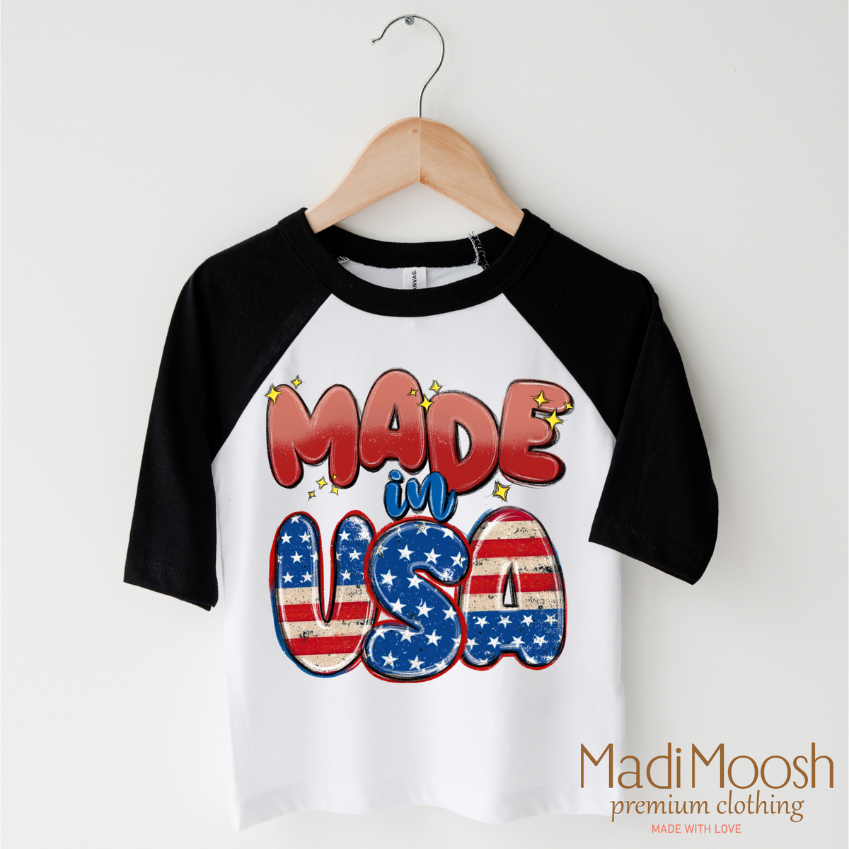 Made In The USA America design on a black-accented shirt.