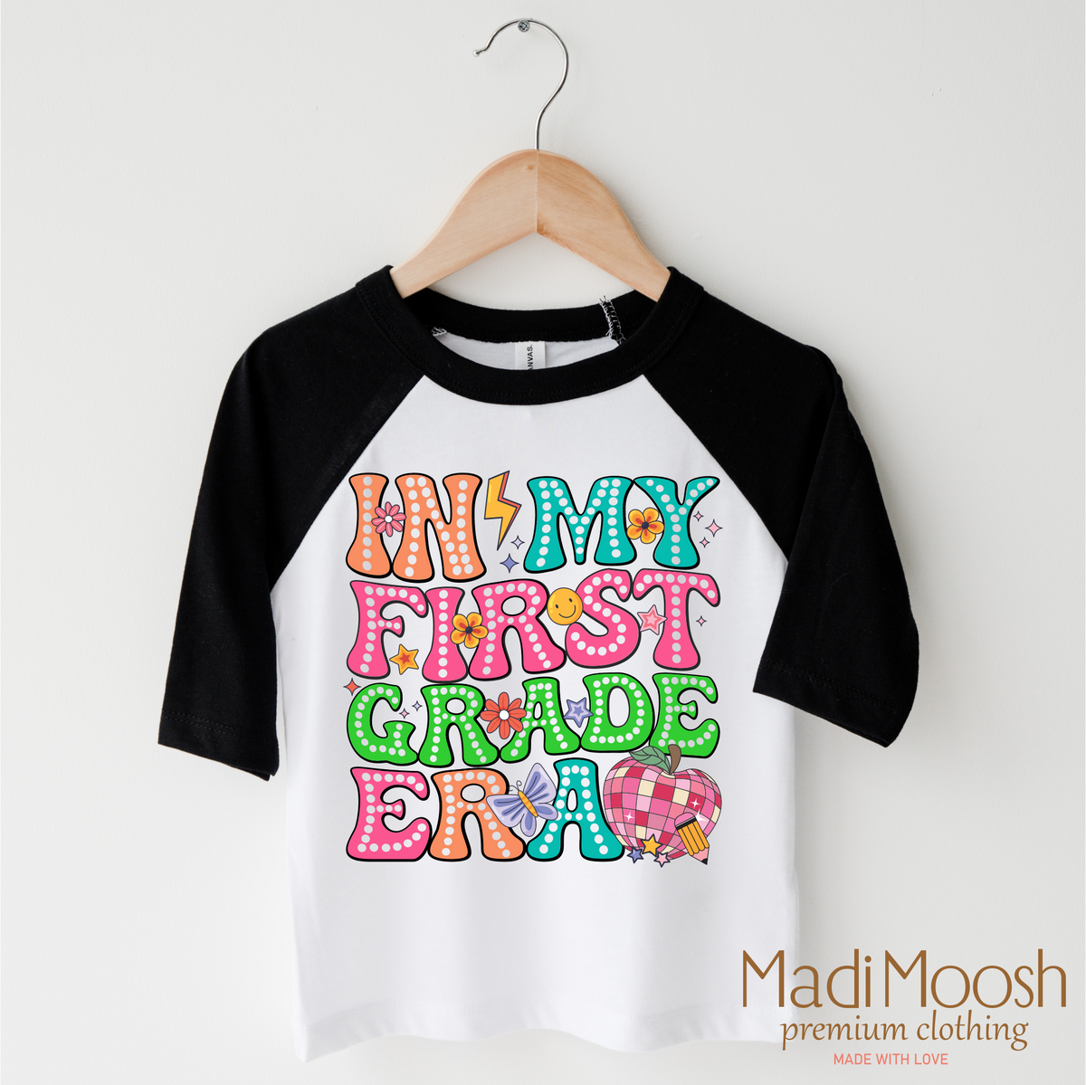 In My 1st Grade Era Back To School design on a black-accented shirt.