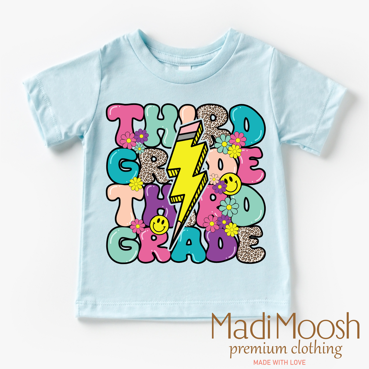 Third Grade Lightning Bolt Back To School design on a blue garment.