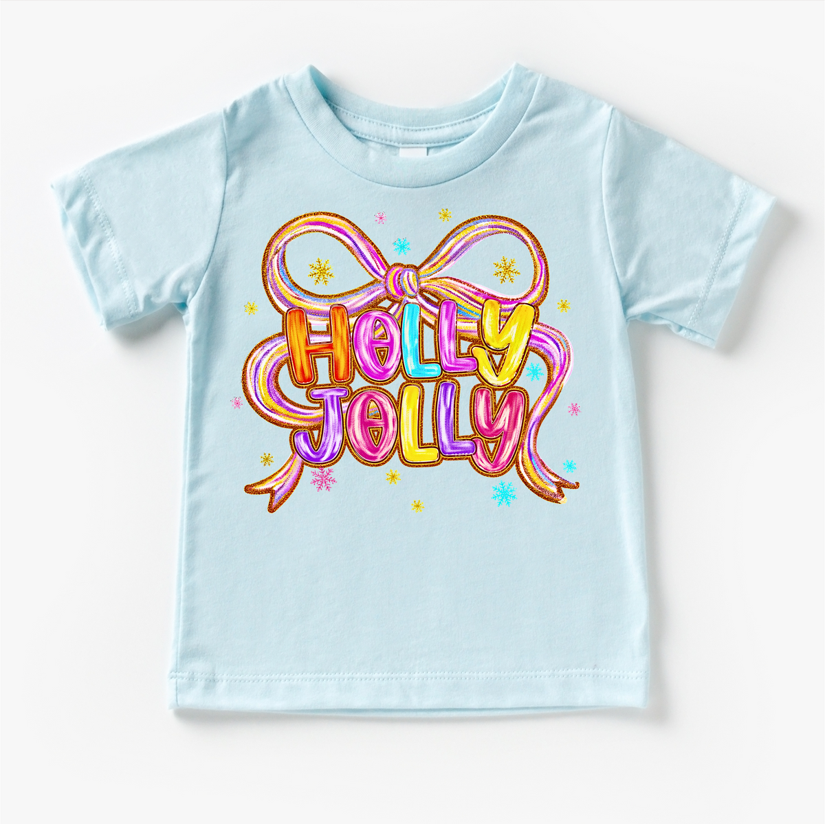 Holly Jolly Ribbon Christmas design on a blue garment.