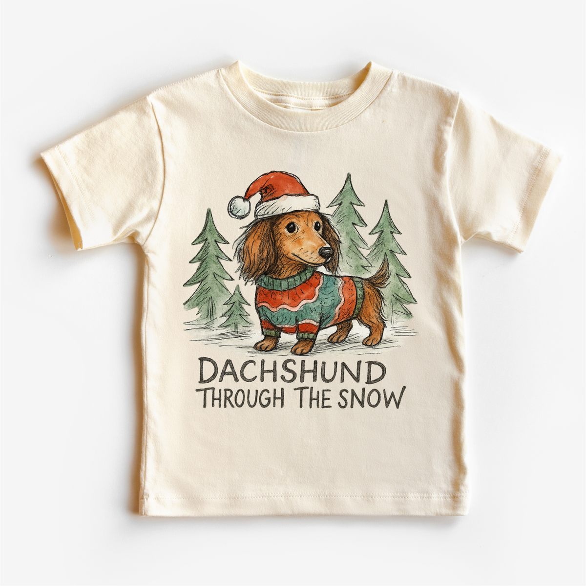 Dachshund Through The Snow Christmas design on a natural garment.