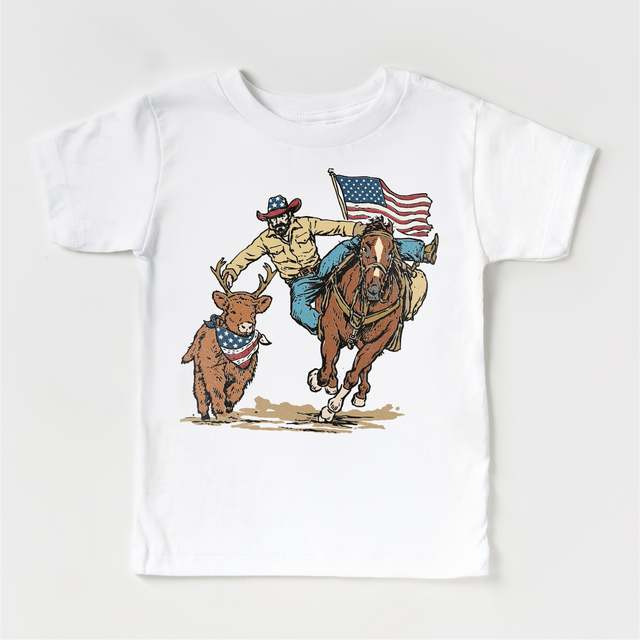 Patriotic Cowboy Kids Shirt, 4th of July Rodeo Tee, American Flag Western Shirt, Cowboy Riding Horse Deer Graphic, Red White Blue Kids Shirt