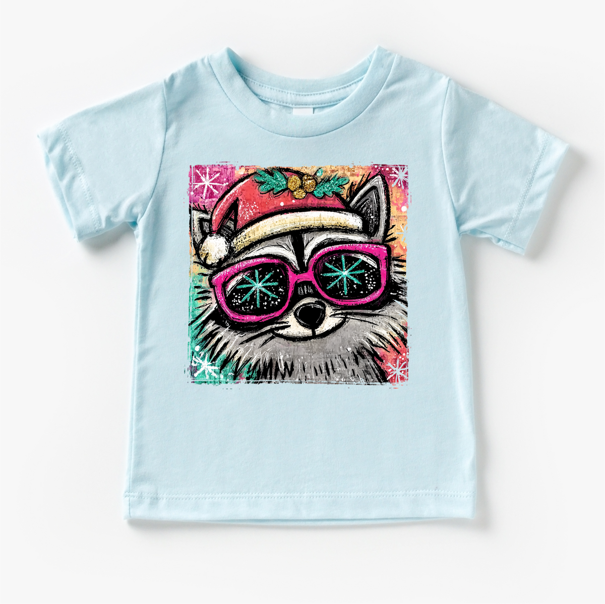 Christmas Raccoon Festive design on a blue garment.