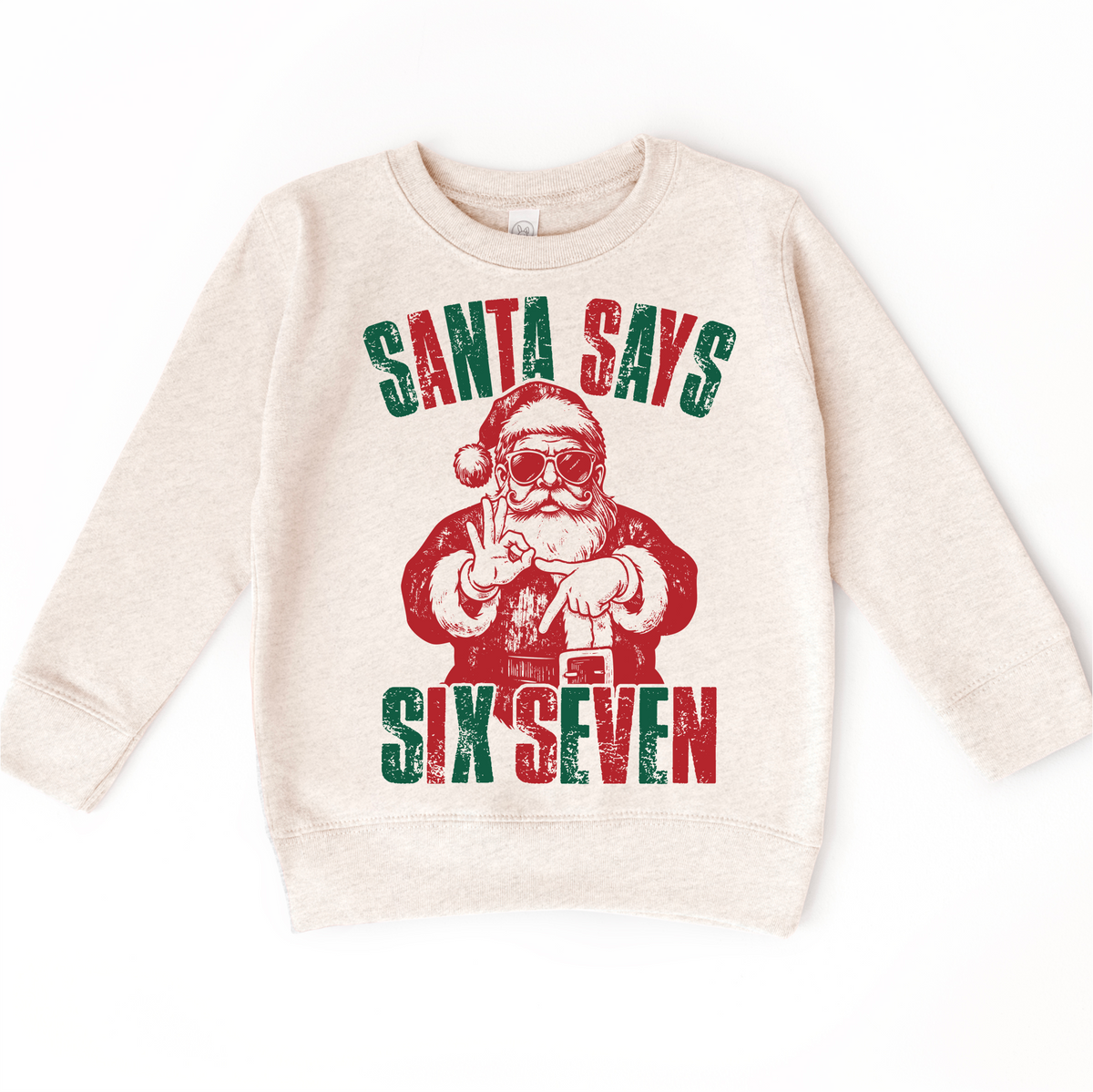 Santa Says Six Seven Christmas design on a natural sweatshirt.