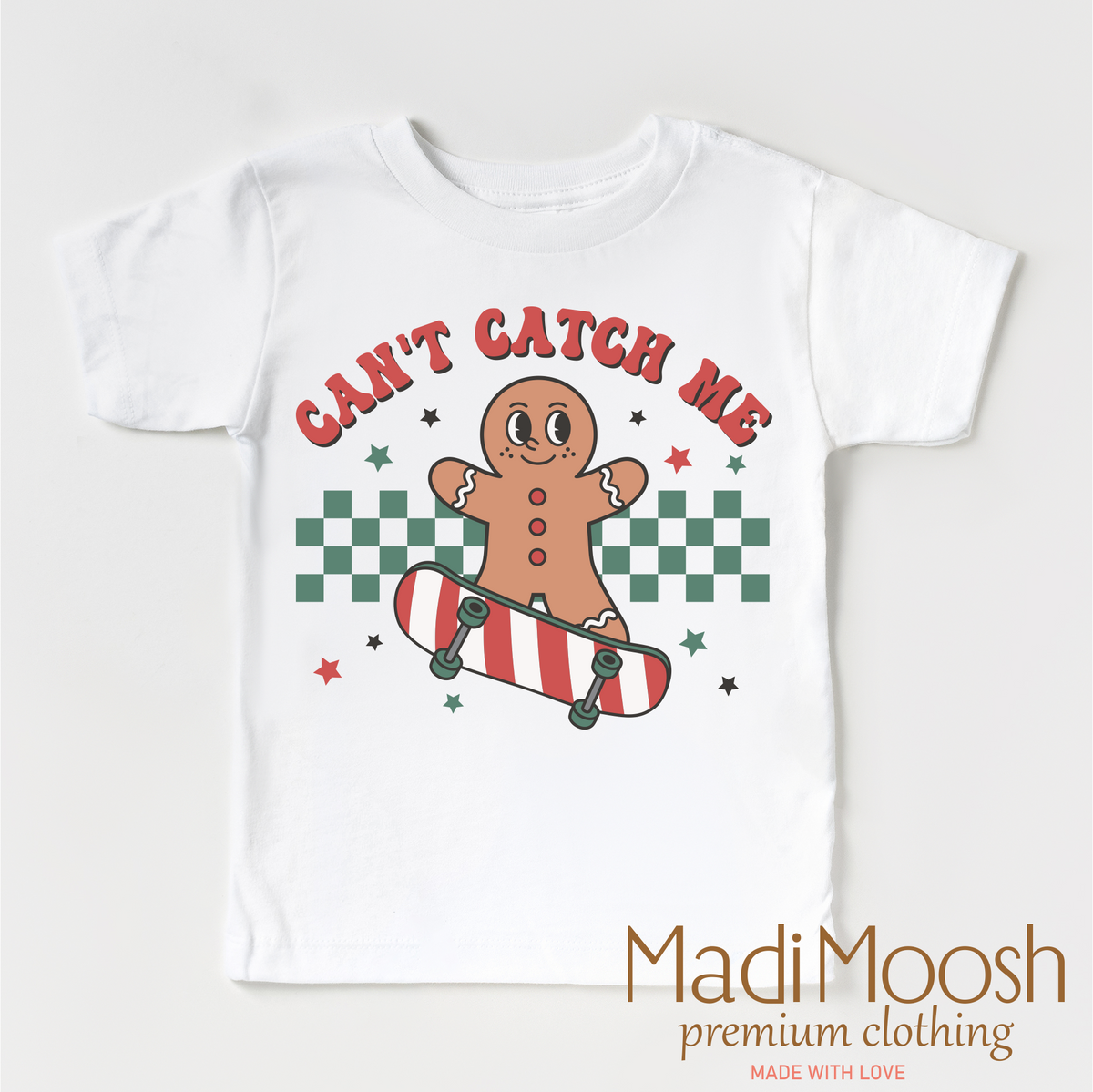 Can't Catch Me Gingerbread Man Christmas design on a white garment.