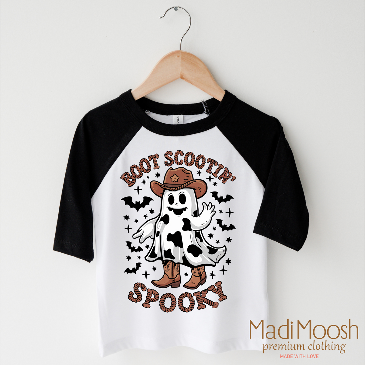 Boot Scootin' Spooky design on a black-accented shirt.